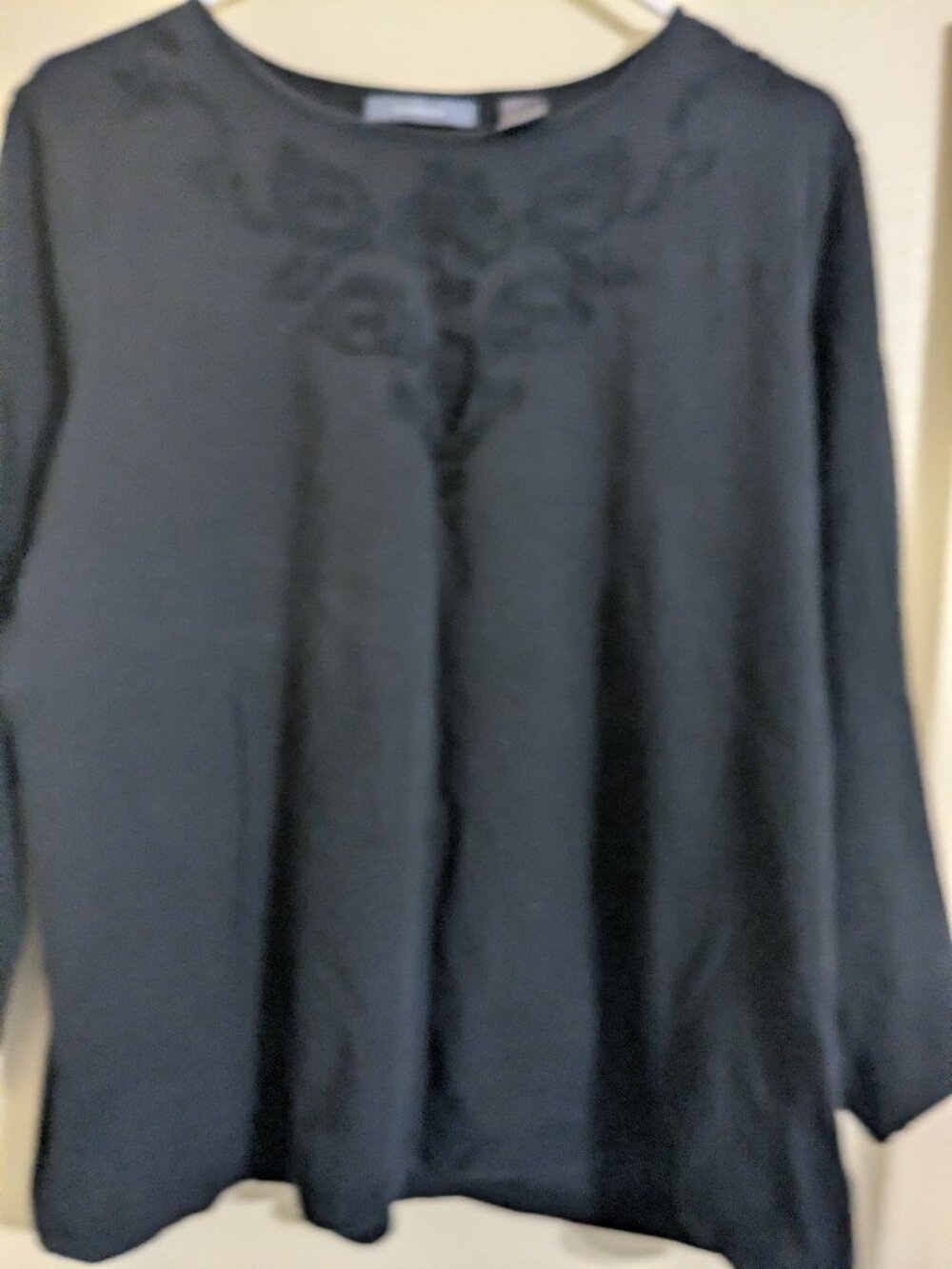 Black with embroidery yolk.